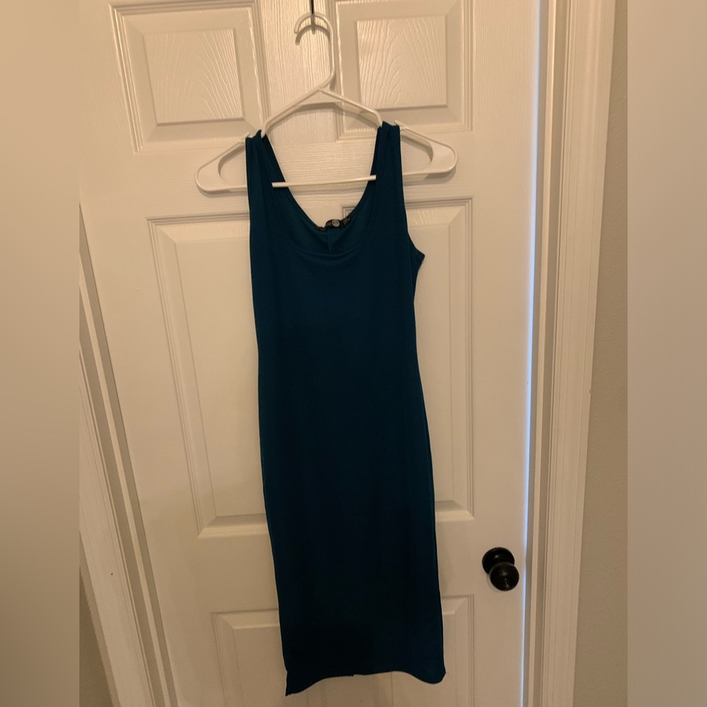 Turquoise Tank style dress with back slit. NWT